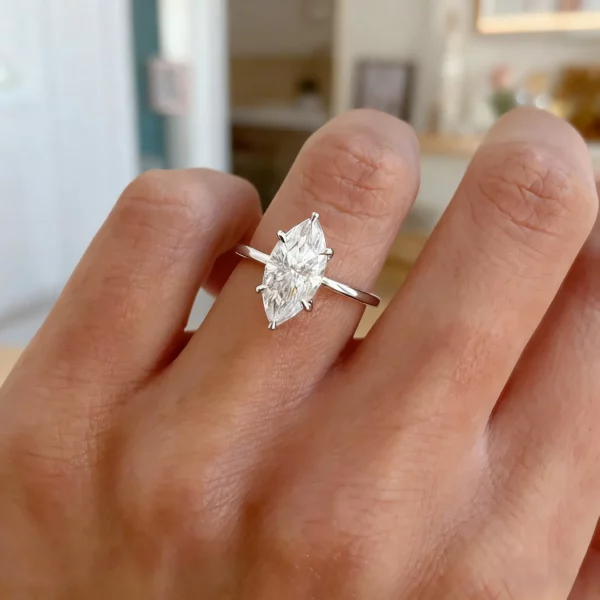 Six Prong Marquise Shaped Moissanite Ring