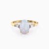 Oval Brilliant Engagement Opal Ring with Tapered Baguette Sidestones