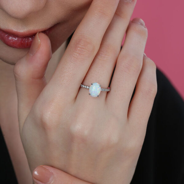 Oval Opal Ring With Hidden Halo