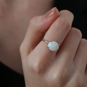 Opal Oval Cut Solitaire East West Ring