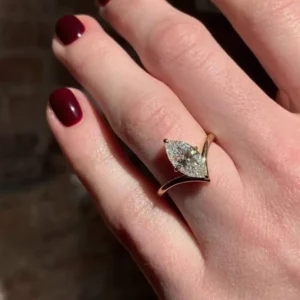 Lane Woods Marquise Cut Solitaire with Deep V Band Moissanite Ring