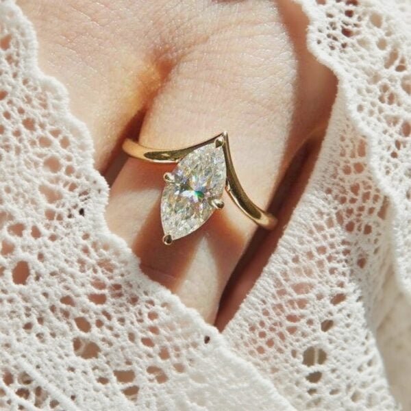 Lane Woods Marquise Cut Solitaire with Deep V Band Moissanite Ring