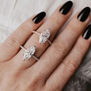 Lane Woods Marquise Shaped Halo Moissanite Engagement Ring With Pave