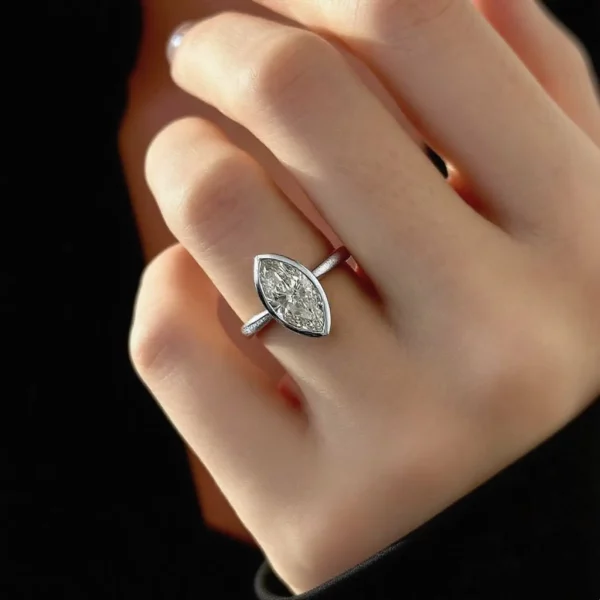 Lane Woods Marquise Solitaire with Bezel Setting Moissanite Ring